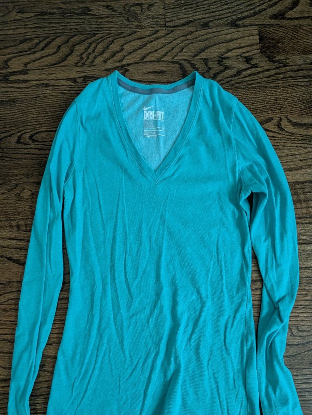 Nike Dri-Fit Women's Long-sleeve V-neck Shirt in teal